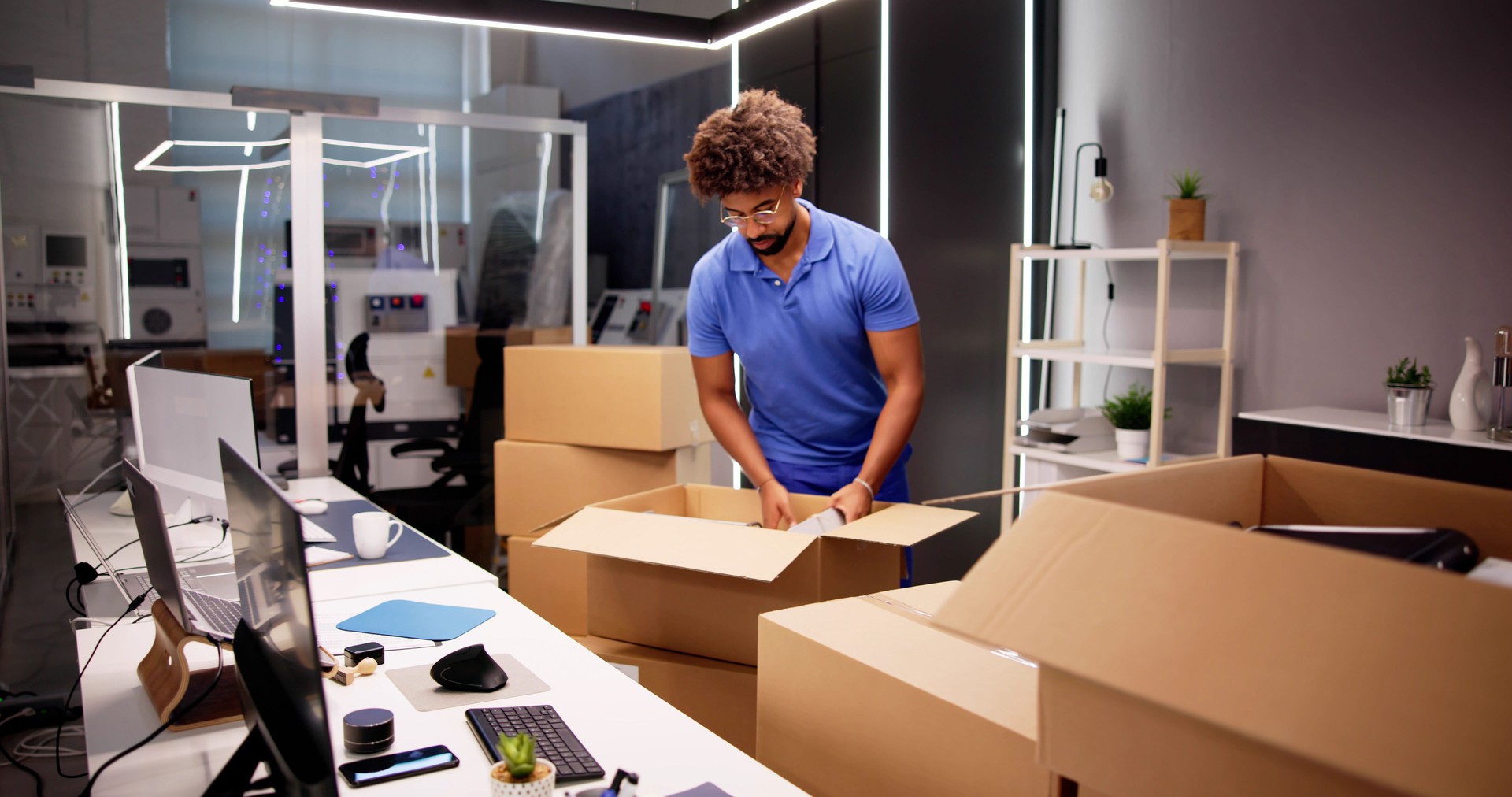 Professional Movers Packing Boxes