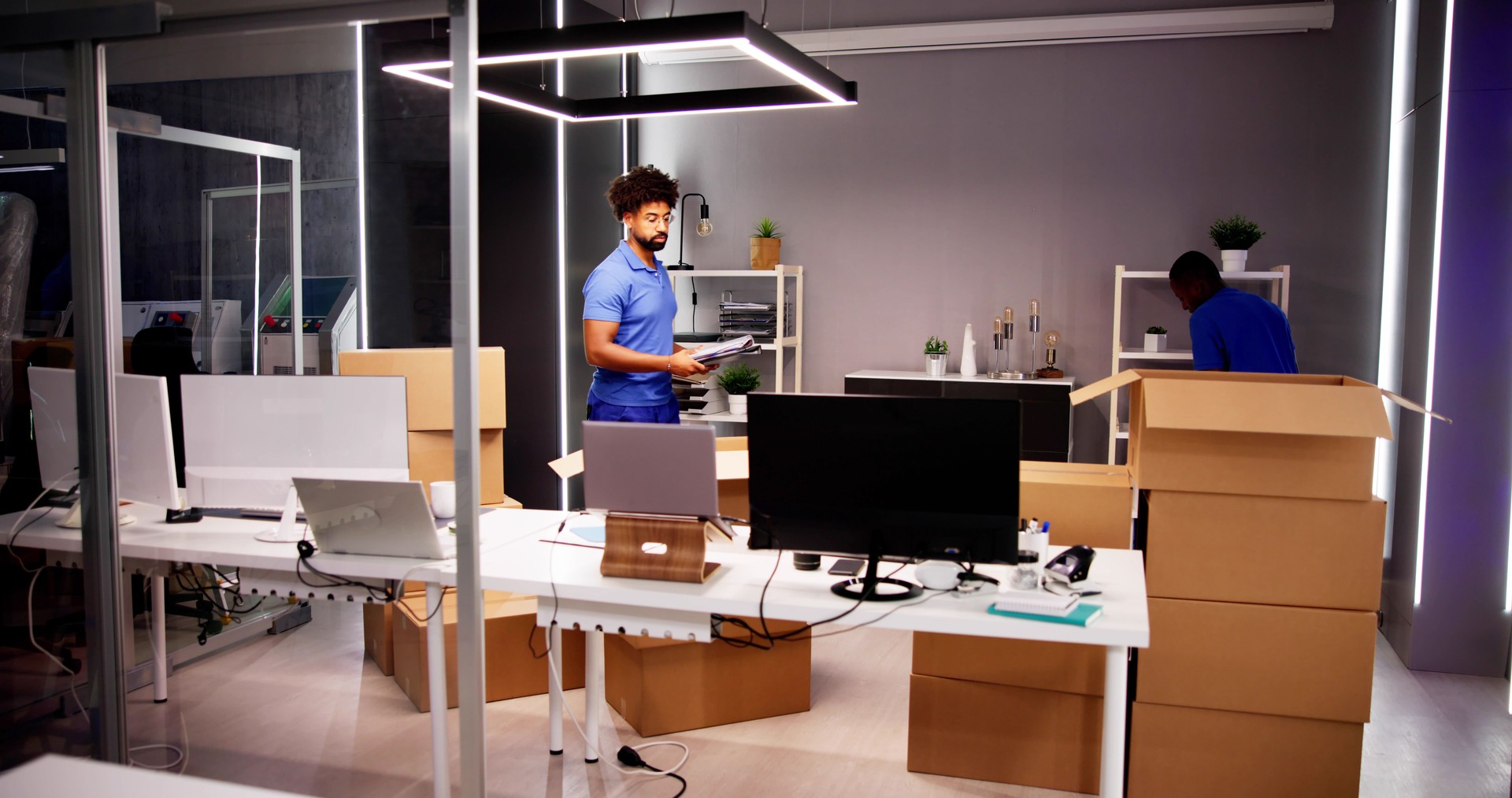 Professional Movers Packing Boxes